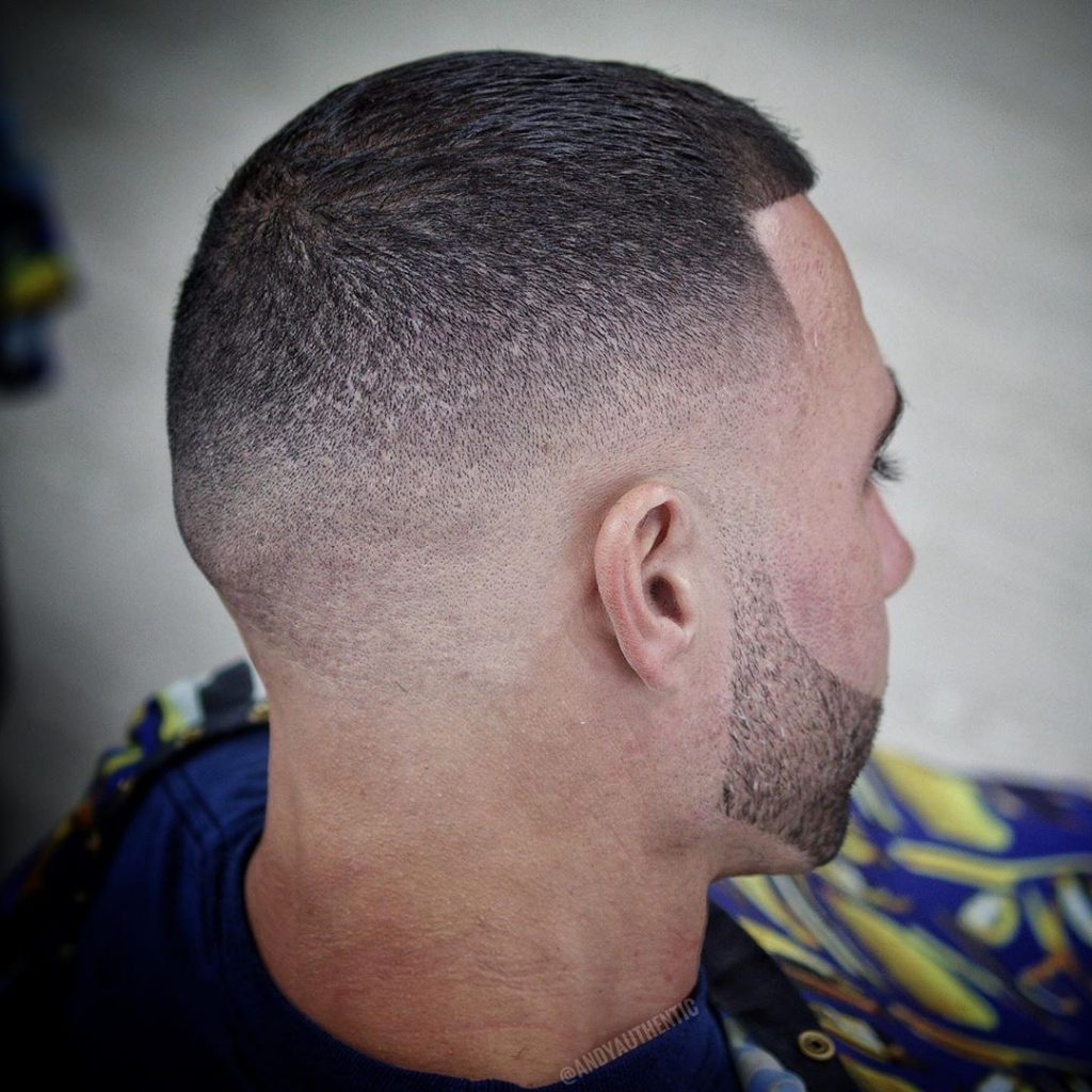 Buzz cut haircut with medium bald fade