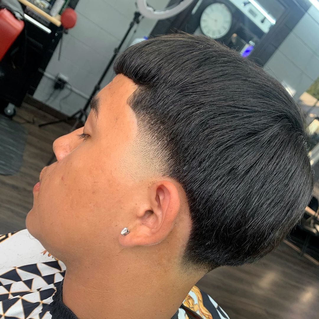 low taper fade fluffy hair