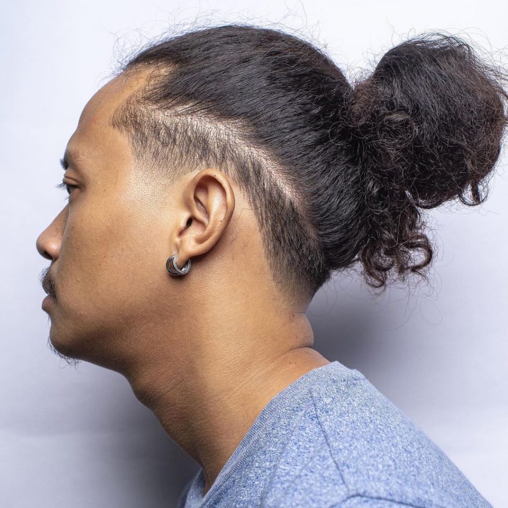 Man bun + low fade