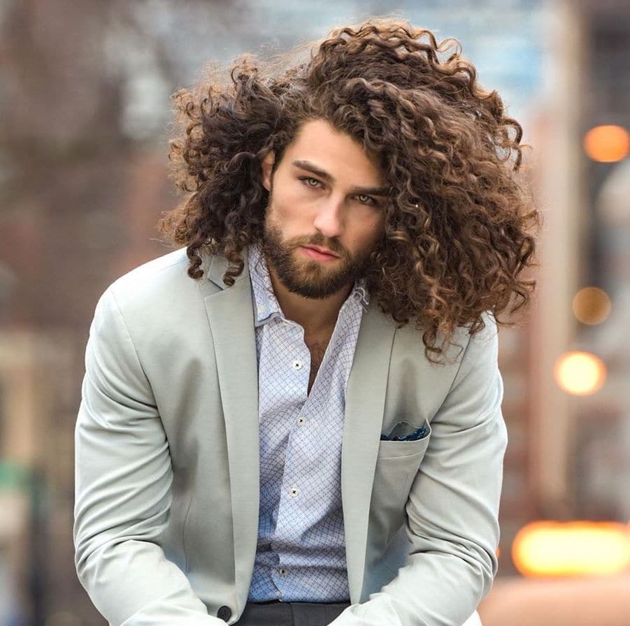 Long thick curly hair men