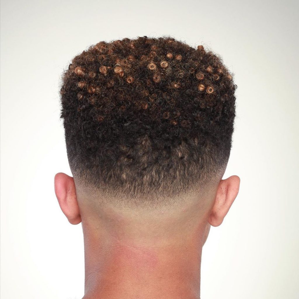 Short curly bald fade haircut