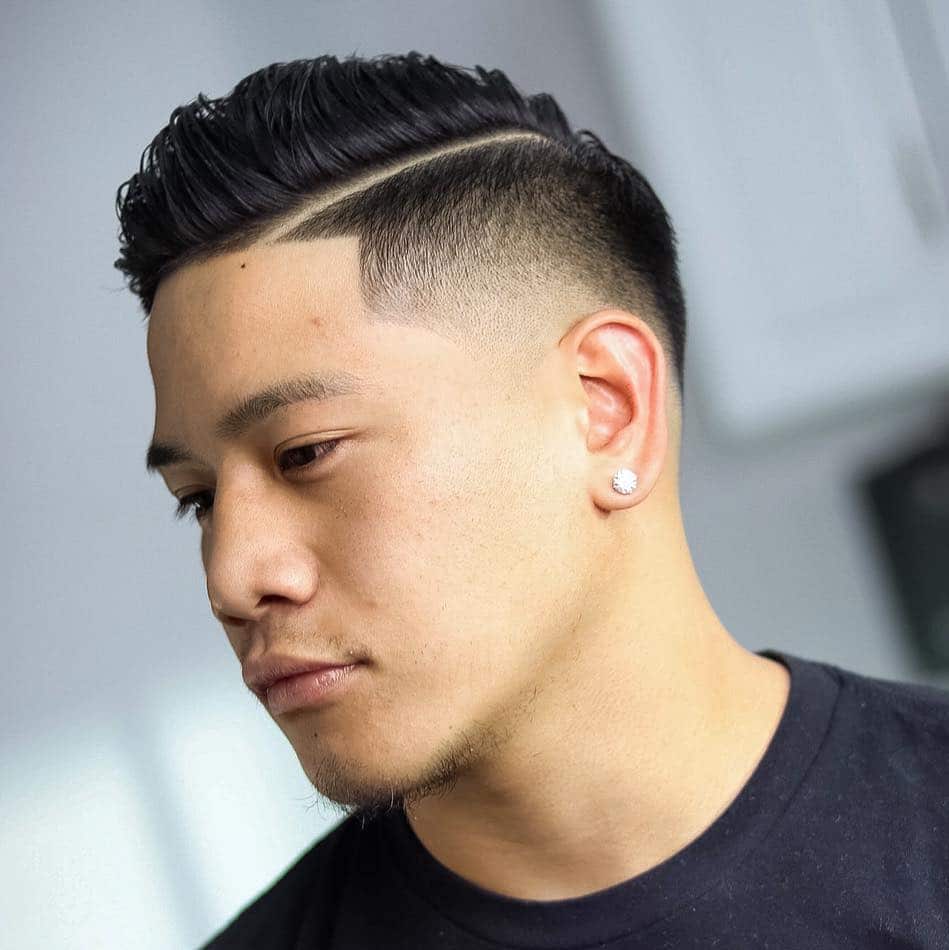 Comb over with low fade and hard part
