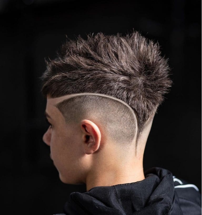 Fade haircut for men with a line