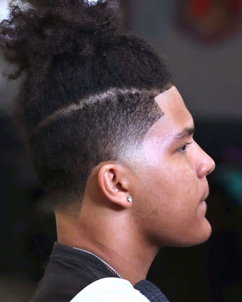 Hidden undercut fade haircut curly hair men