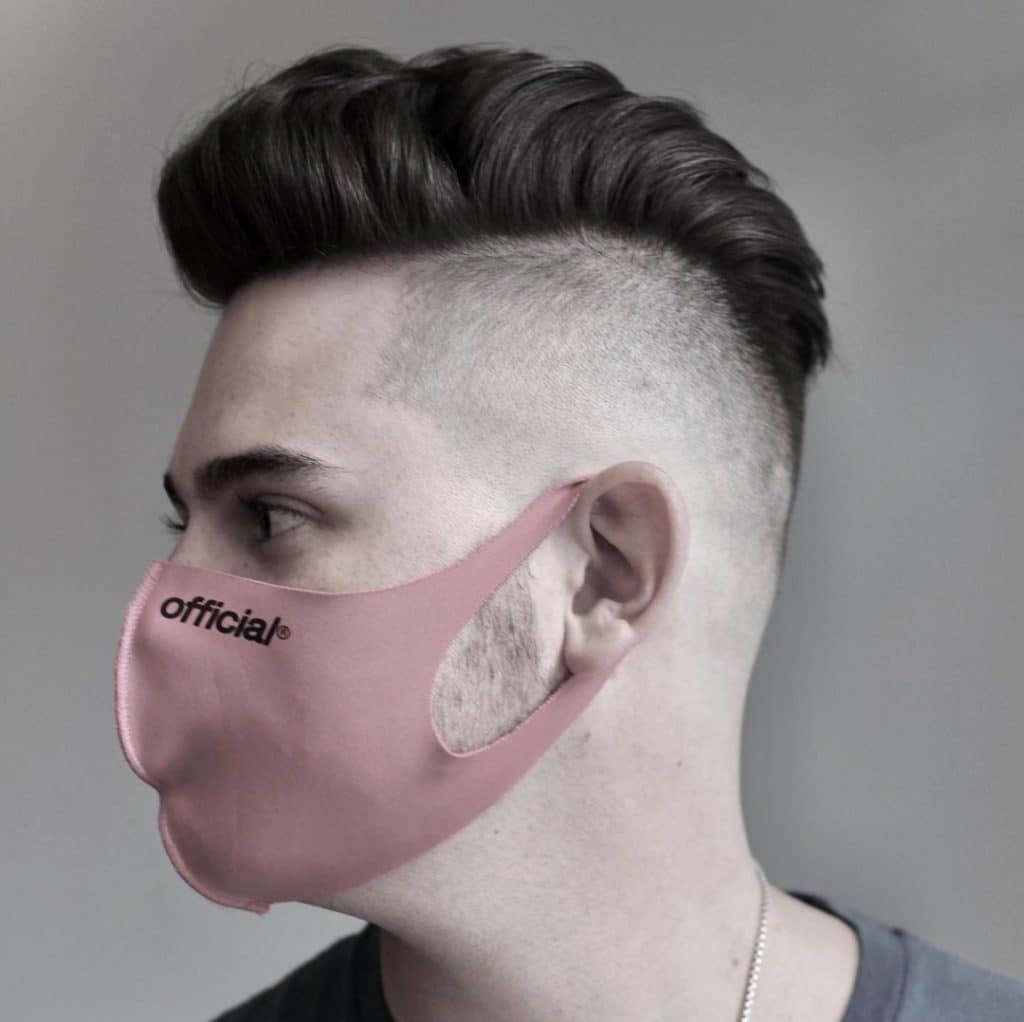 Disconnected undercut hairstyle pomp