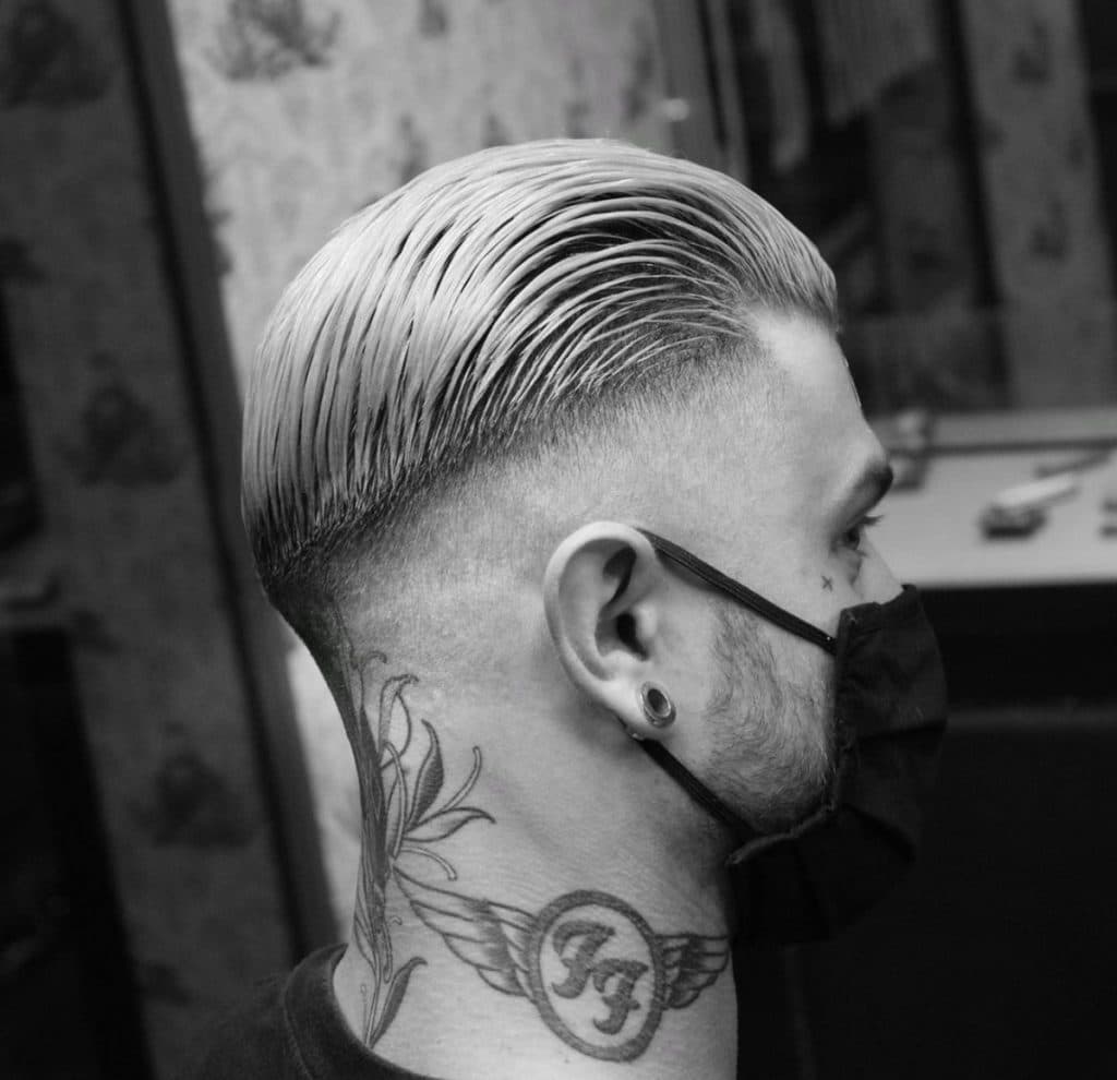 Slick back fade haircut