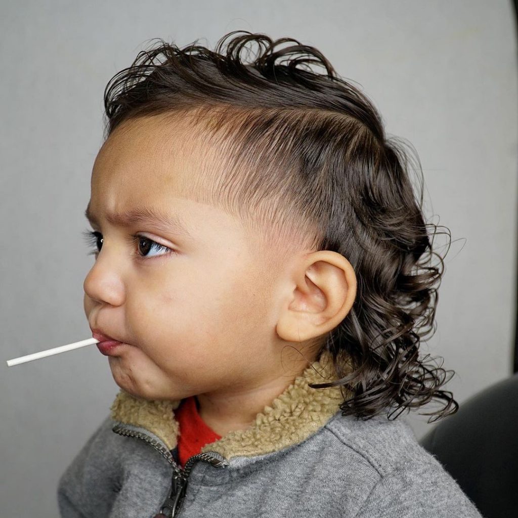 Curly mullet haircut for boys