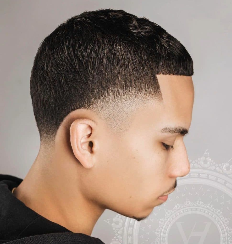 Buzz cut with medium taper fade