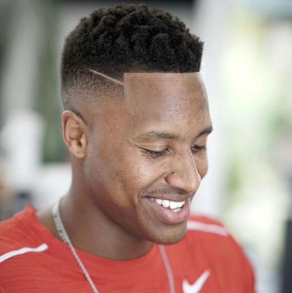 High top fade for Black men Courtland Sutton