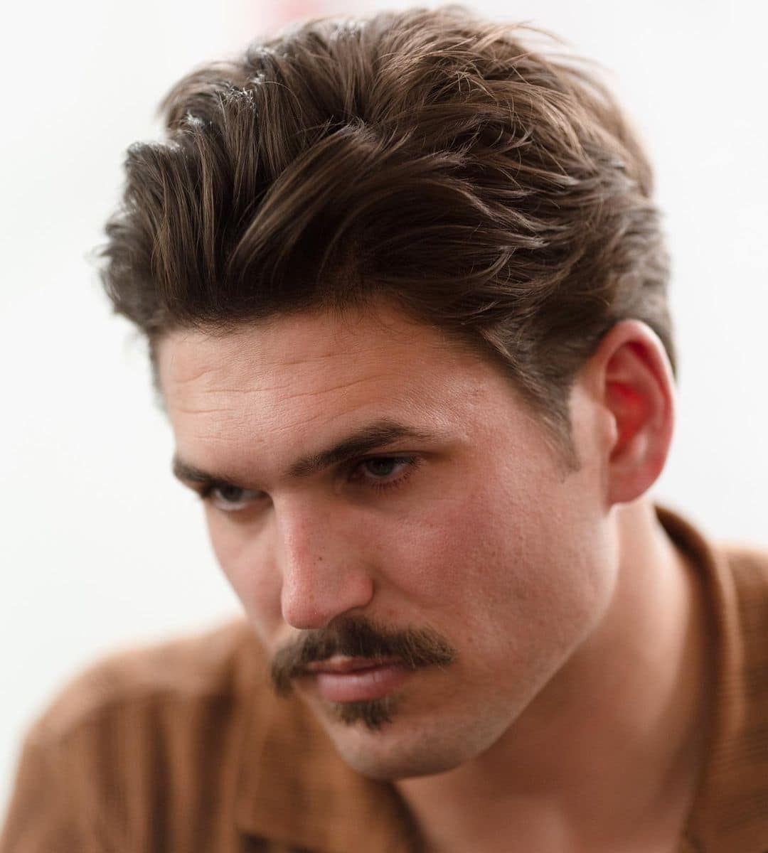 The Trendiest Hairstyle for Men the Year You Were Born