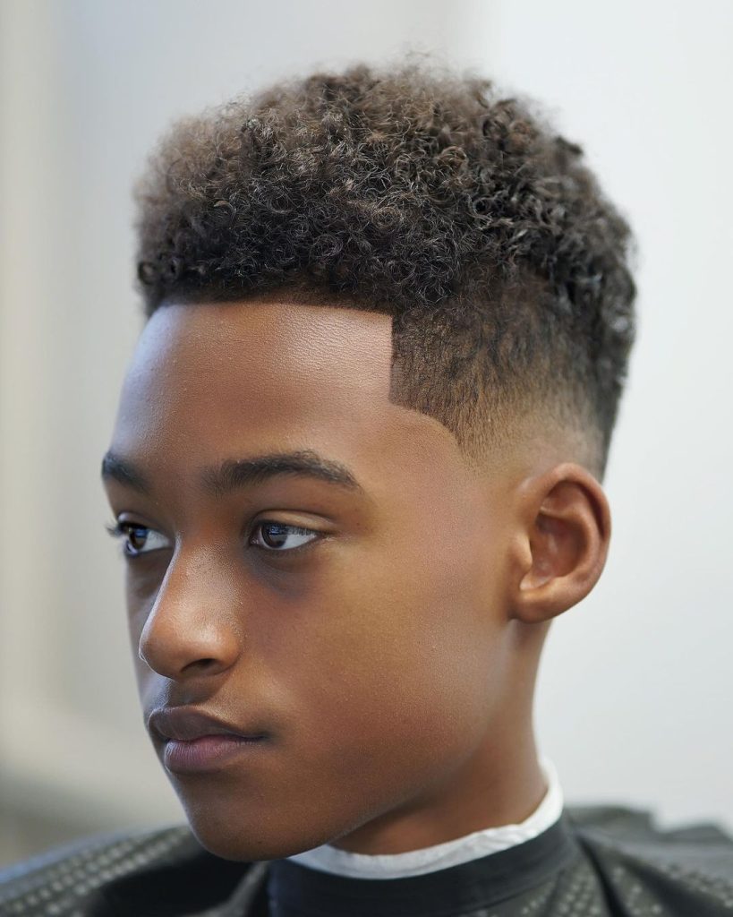 Mid drop fade haircut for Black boys