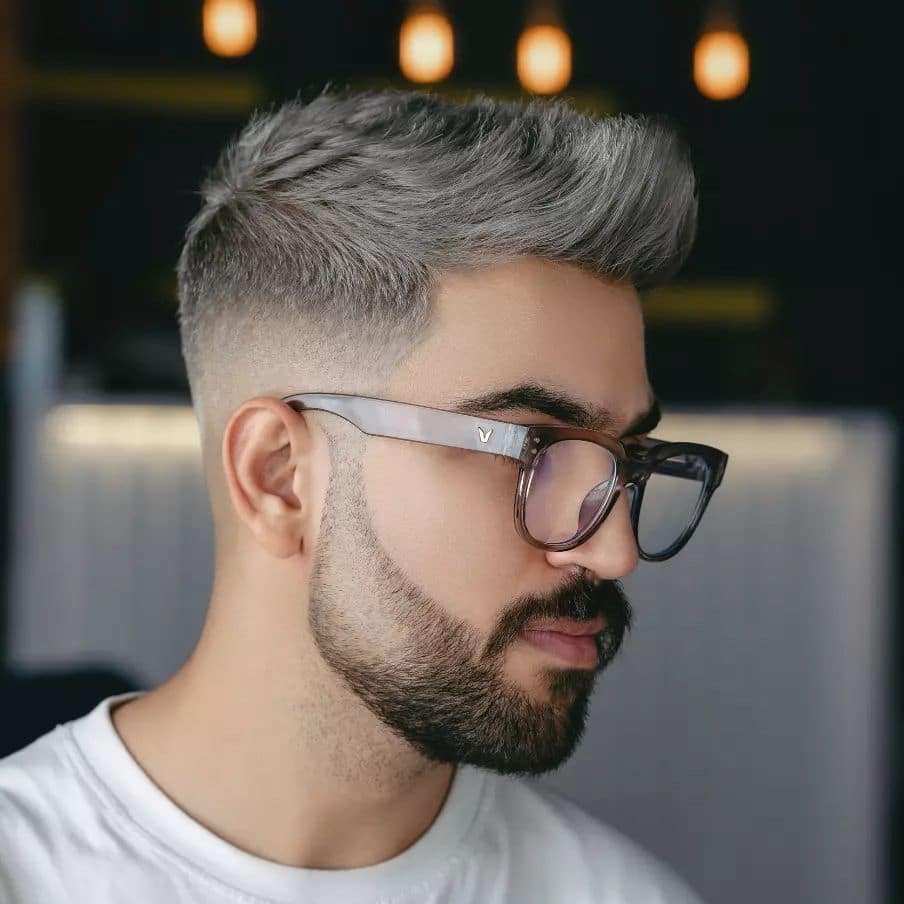 Mid fade haircut with beard fade