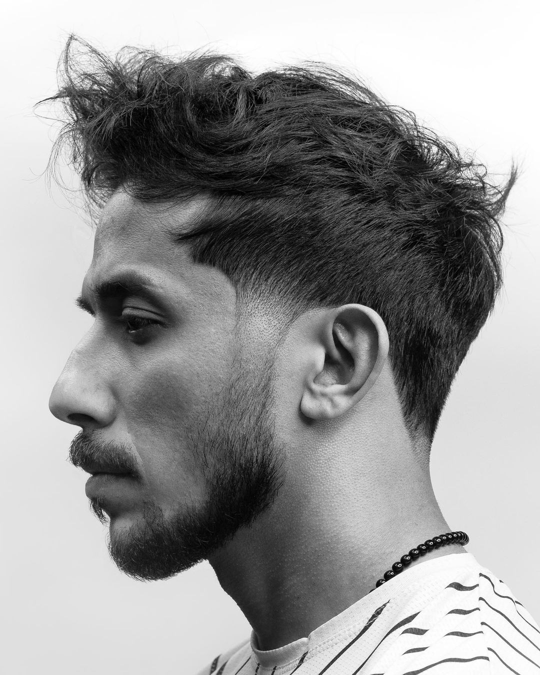 Low taper fade hairstyle