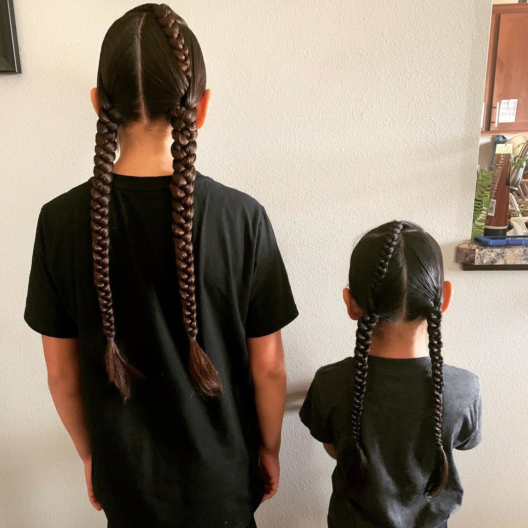 Two braids styles native American Indian boys men