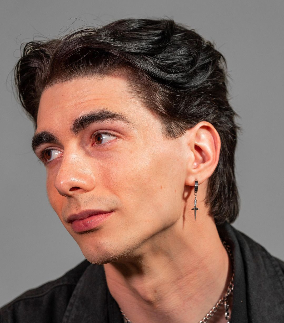 The wolf cut Richard Greico hair 80s 90s one earring